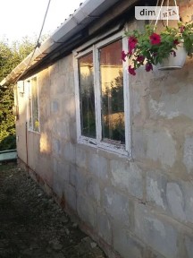 Продаж 1 поверхового будинку з опаленням і ділянкою на 10 соток, 40 кв. м, 2 кімнати, на вул. Лесі Українки • ID 34615896