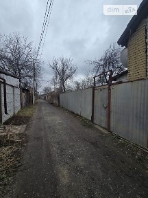 Продаж 1 поверхового будинку з гаражем і ділянкою на 4 сотки, 52.2 кв. м, 1 кімната, на 1-й в'їзд Стрілецький • ID 34638058
