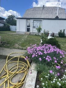 Продаж 1 поверхового будинку з гаражем 100 кв. м, 3 кімнати, на вул. Соборна • ID 34643320
