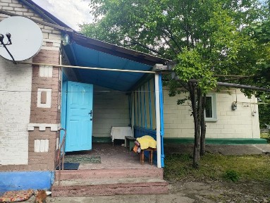 Житловий будинок, земельні ділянки, два окремих входа