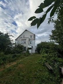 Двоповерховий будинок з мансардою в с. Трушки