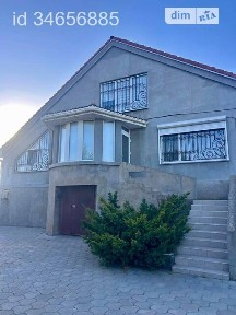 Продаж 2 поверхового будинку з гаражем і ділянкою на 10 соток, 168.5 кв. м, 3 кімнати, на вул. Польова • ID 34656885