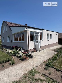 Продаж 1 поверхового будинку з гаражем і ділянкою на 25 соток, 135.9 кв. м, 3 кімнати, на вул. Молодіжна • ID 34653022