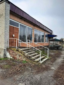 Продам колишній універмаг з житловим приміщенням в Полтавській обл.