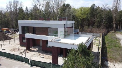 Продаж сучасного будинку 300 м² + 39 соток в сосновому лісі