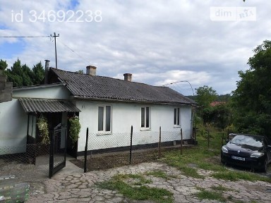 Продаж 1 поверхового будинку з опаленням і ділянкою на 4.57 сотки, 63.9 кв. м, 2 кімнати, на вул. Українки Лесі • ID 34692238
