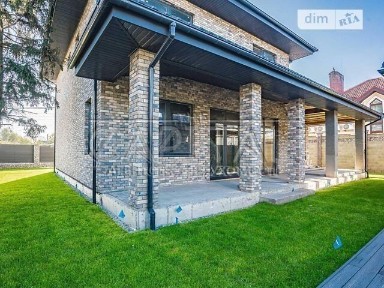 Продаж 2 поверхового будинку з гаражем і ділянкою на 7 соток, 260 кв. м, 5 кімнат, на вул. Центральна • ID 34694399