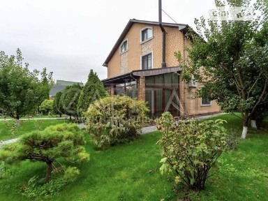 Продаж 3 поверхового будинку з гаражем і ділянкою на 12 соток, 323 кв. м, 8 кімнат, на вул. Святкова • ID 34693684