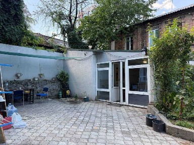 Купите квартиру с собственным двориком и парковкой в центре на М. Грушевского