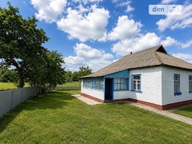 Продаж 1 поверхового будинку з гаражем і ділянкою на 54 сотки, 76 кв. м, 4 кімнати, на вул. Центральна • ID 34706951