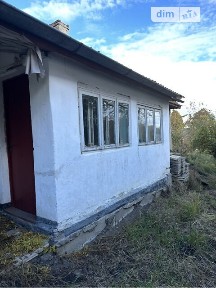 Продаж 1 поверхового будинку з гаражем і ділянкою на 15 соток, 48.8 кв. м, 2 кімнати, на вул. Січових стрільців • ID 34560284