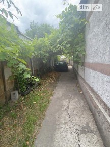 Продаж 1 поверхового будинку з опаленням і ділянкою на 5 соток, 97.1 кв. м, 8 кімнат, на пров. Ковальський • ID 34545017