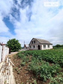 Продаж 2 поверхового будинку з верандою і ділянкою на 10 соток, 113.2 кв. м, 3 кімнати, на вул. Богдана Хмельницького • ID 34540382