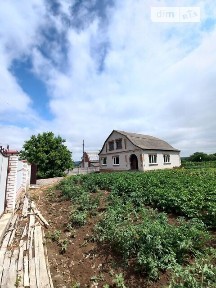 Продаж 2 поверхового будинку з верандою і ділянкою на 10 соток, 113.2 кв. м, 3 кімнати, на вул. Богдана Хмельницького • ID 34540382