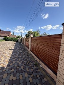 Продаж 2 поверхового будинку з гаражем і ділянкою на 10 соток, 198.8 кв. м, 4 кімнати, на вул. Гагаріна • ID 34534919