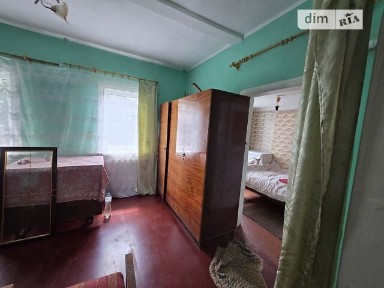 Продаж 1 поверхового будинку з ділянкою на 8 соток, 66.4 кв. м, 4 кімнати, на вул. Євгена Коновальця • ID 34560038