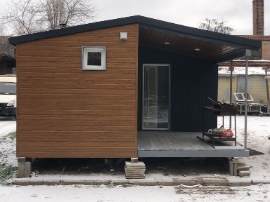 Модульний будинок з каміном.
