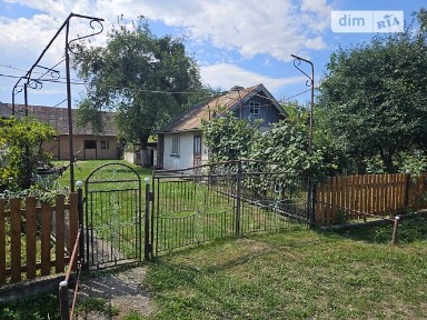 Продаж 1 поверхового будинку з гаражем і ділянкою на 25 соток, 74.2 кв. м, 2 кімнати, на Б. Хмельницького 23 • ID 34724669