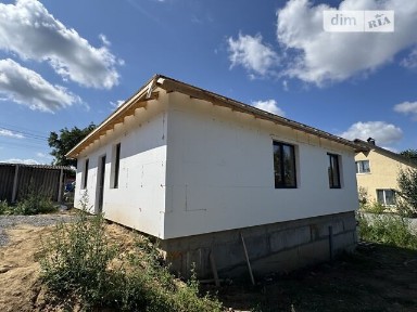 Продаж 1 поверхового будинку з гаражем і ділянкою на 4 сотки, 76.64 кв. м, 2 кімнати, на вул. Центральна 102 • ID 34721899