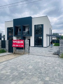 Будинок з автонавісом та терасою у Крюківщині