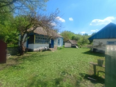 Продам дім з земельною ділянкою