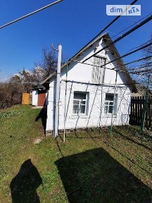 Продаж 1 поверхового будинку з гаражем 29 кв. м, 1 кімната • ID 34732046