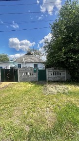Частина будинку з окремим двором, гараж