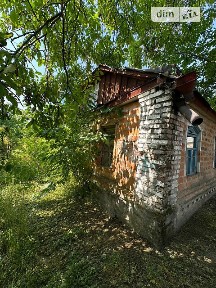 Продаж 1 поверхового будинку з верандою і ділянкою на 629 кв. м., 131 кв. м, 4 кімнати, на пров. 1-й Западинської (Крупської 1-й) 82 • ID 34785761