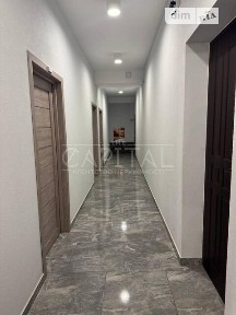 Продаж офісного приміщення 97.3 кв. м. на 1 поверсі на вул. Руданського Степана, п'ятиповерхова будівля • ID 34810072