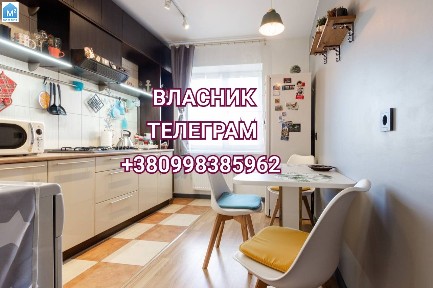 Власник