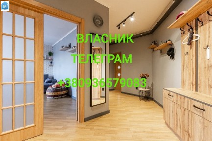 Власник