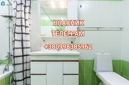Власник