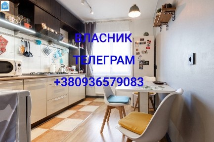 Власник