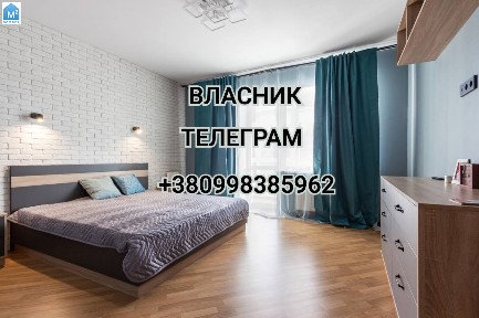 Власник