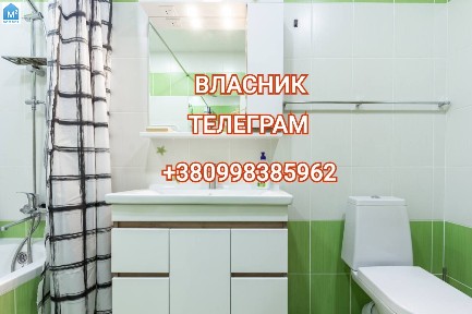 Власник