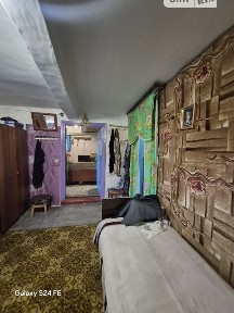 Продаж 1 поверхового будинку з верандою і ділянкою на 64 сотки, 53 кв. м, 3 кімнати, на вул. Жовтнева • ID 34823549