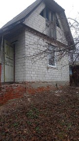 Двоповерховий будинок 