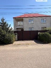 Продаж 2 поверхового будинку з верандою і ділянкою на 18 соток, 296.8 кв. м, 5 кімнат, на вул. Київська 1А • ID 34845241