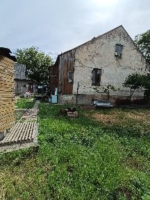 Терміново продам 1/2 будинку р-н Калинівсьуого базару!