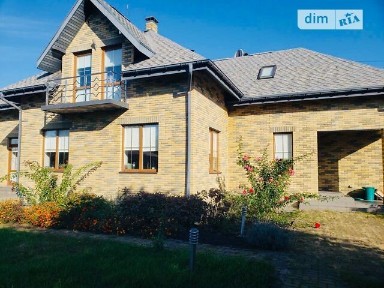 Продаж 2 поверхового будинку з верандою і ділянкою на 18 соток, 262.2 кв. м, 7 кімнат, на вул. Вишнева • ID 34967290