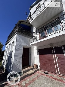 Продаж 3 поверхового будинку з верандою і ділянкою на 23 сотки, 297 кв. м, 8 кімнат, на вул. Дружби • ID 34998290