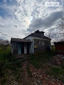 Продаж 1 поверхового будинку з ділянкою на 25 соток, 58.9 кв. м, 3 кімнати, на Центральна • ID 35001636