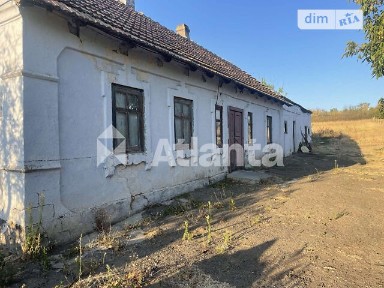 Продаж 1 поверхового будинку з ділянкою на 25 соток, 40.6 кв. м, 2 кімнати, на вул. Шкільна • ID 34786136