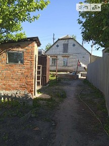 Продаж 1 поверхового будинку з опаленням і ділянкою на 5 соток, 55.5 кв. м, 2 кімнати, на вул. Соборна • ID 34737771