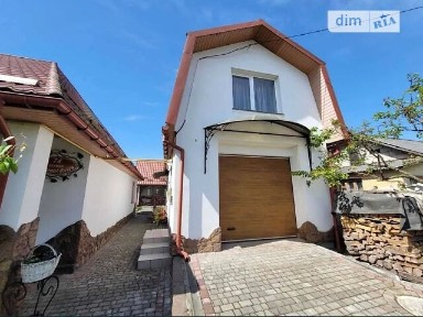 Продаж 2 поверхового будинку з гаражем і ділянкою на 6.8 сотки, 350 кв. м, 9 кімнат, на вул. Княгині Ольги • ID 34707956