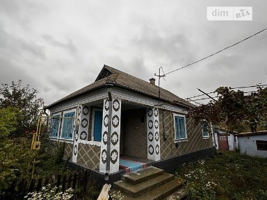 Продаж 1 поверхового будинку з верандою і ділянкою на 50 соток, 54 кв. м, 3 кімнати, на вул. Хліборобів • ID 35051424