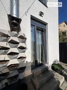 Продаж 2 поверхового таунхауса з ділянкою на 3 сотки, 100.3 кв. м, 4 кімнати, на вул. Центральна 39Б • ID 35078344