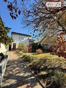 Продаж 2 поверхового будинку з верандою і ділянкою на 18.5 сотки, 183.4 кв. м, 5 кімнат, на вул. Дружби • ID 35079488