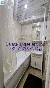 Власник